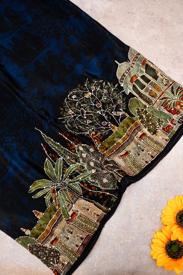 Art-Inspired Teal Blue Crepe Silk Saree – Soft Drape with Unique Figure Prints