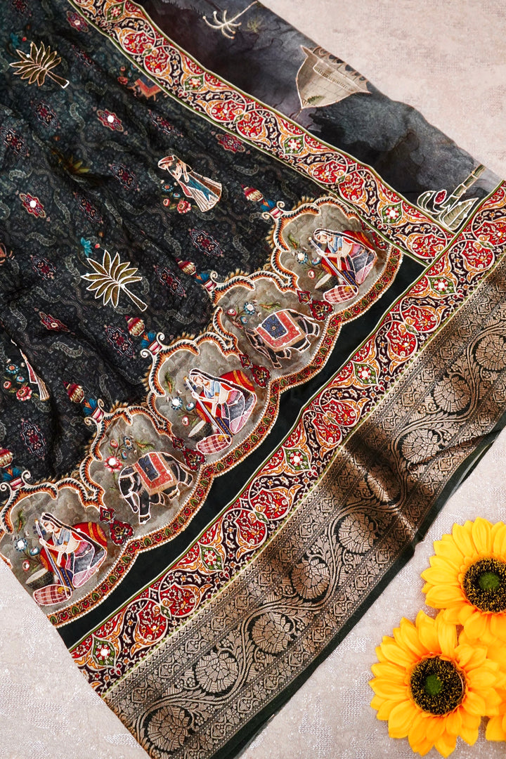 Teal Green Crepe Silk Saree with Statement Figure Motifs