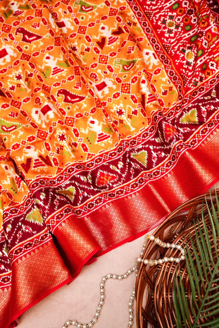 Yellow Patola Silk Saree with Zari Weave Contrast Border