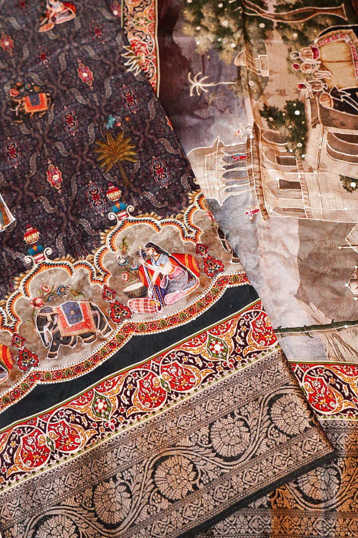 Striking Black Crepe Silk Saree with Handcrafted Style Figure Motifs