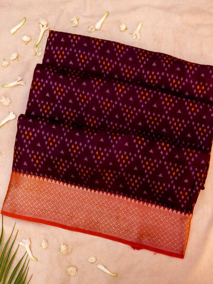 Wine Elegance Crepe Silk Saree with Geometric Prints and Zari Weave Accents