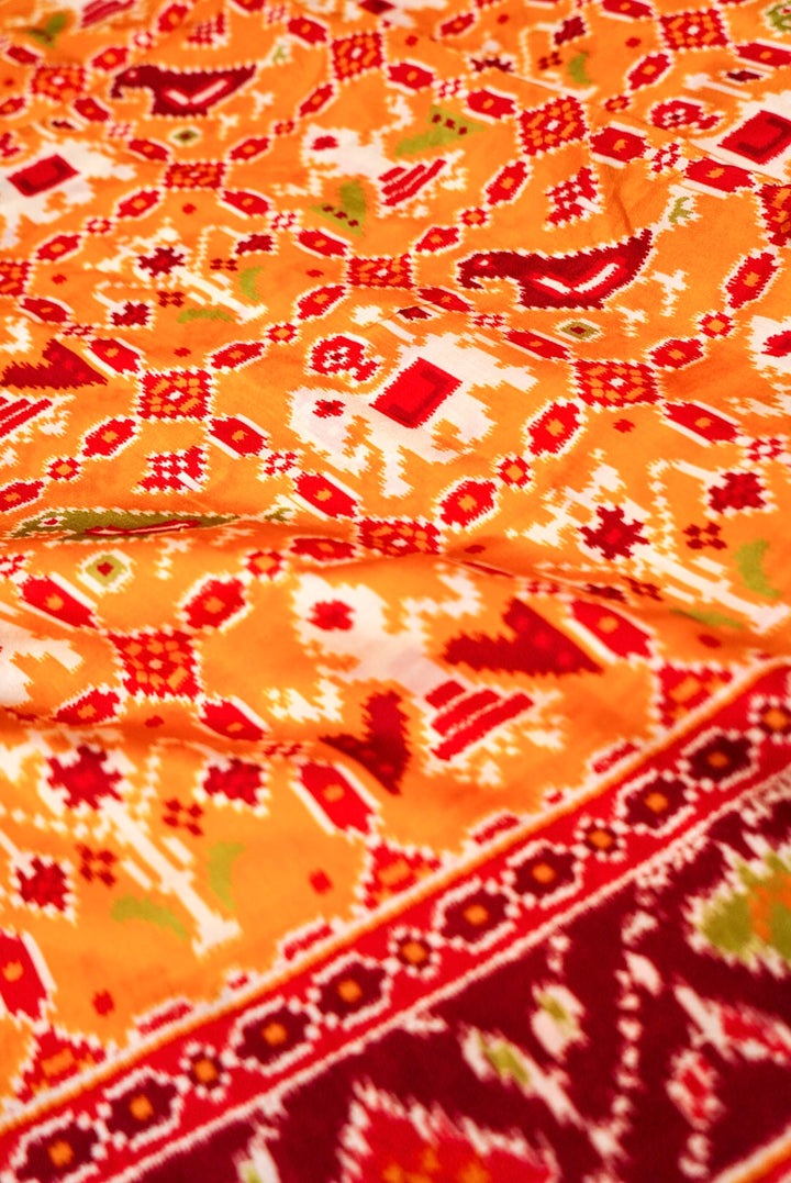 Yellow Patola Silk Saree with Zari Weave Contrast Border