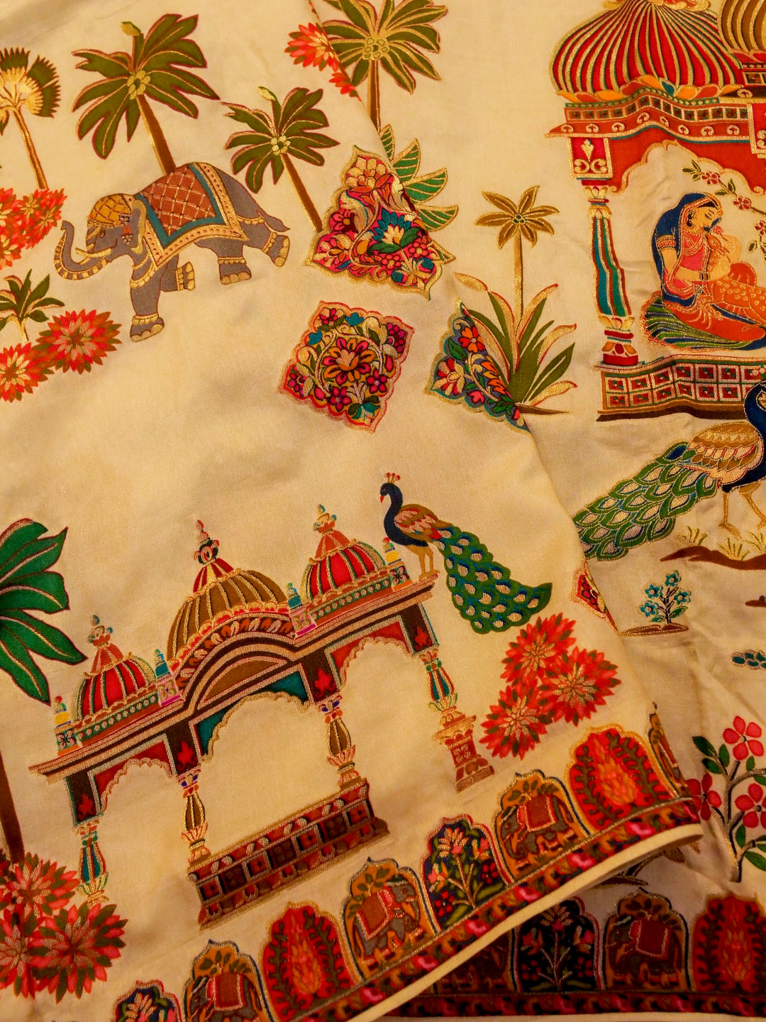 Whispers of Nature Beige Crepe Silk Saree with Bird and Figure Motifs