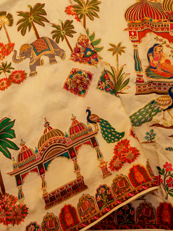 Whispers of Nature Beige Crepe Silk Saree with Bird and Figure Motifs