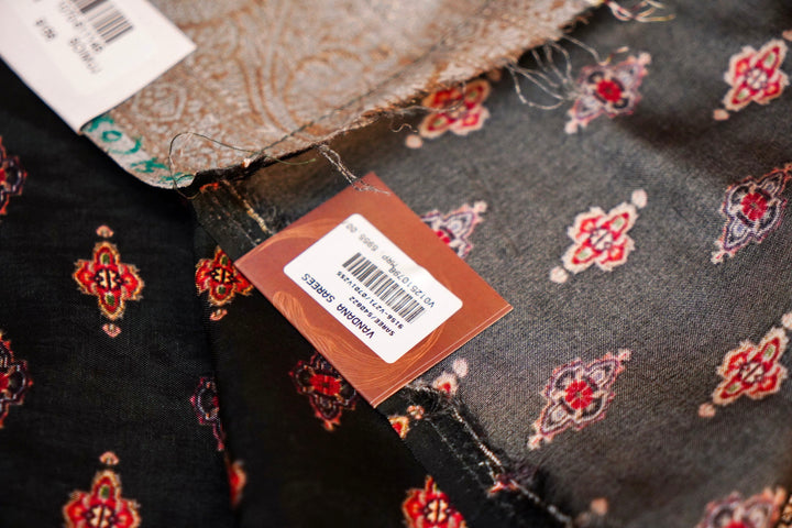 Striking Black Crepe Silk Saree with Handcrafted Style Figure Motifs