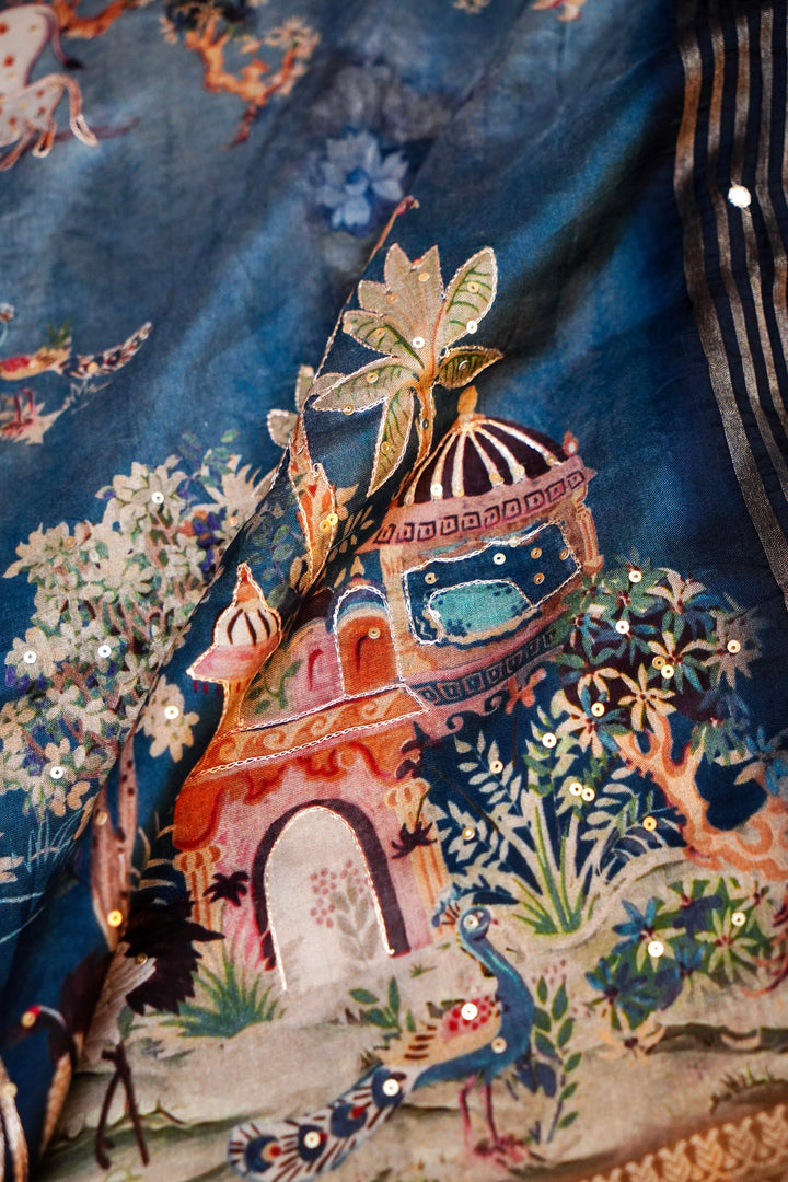 Soft Sky Blue Printed Crepe Silk Saree Featuring Artistic Figure Designs