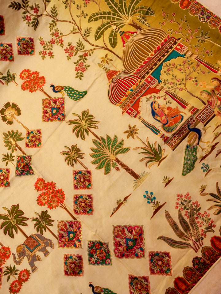 Whispers of Nature Beige Crepe Silk Saree with Bird and Figure Motifs