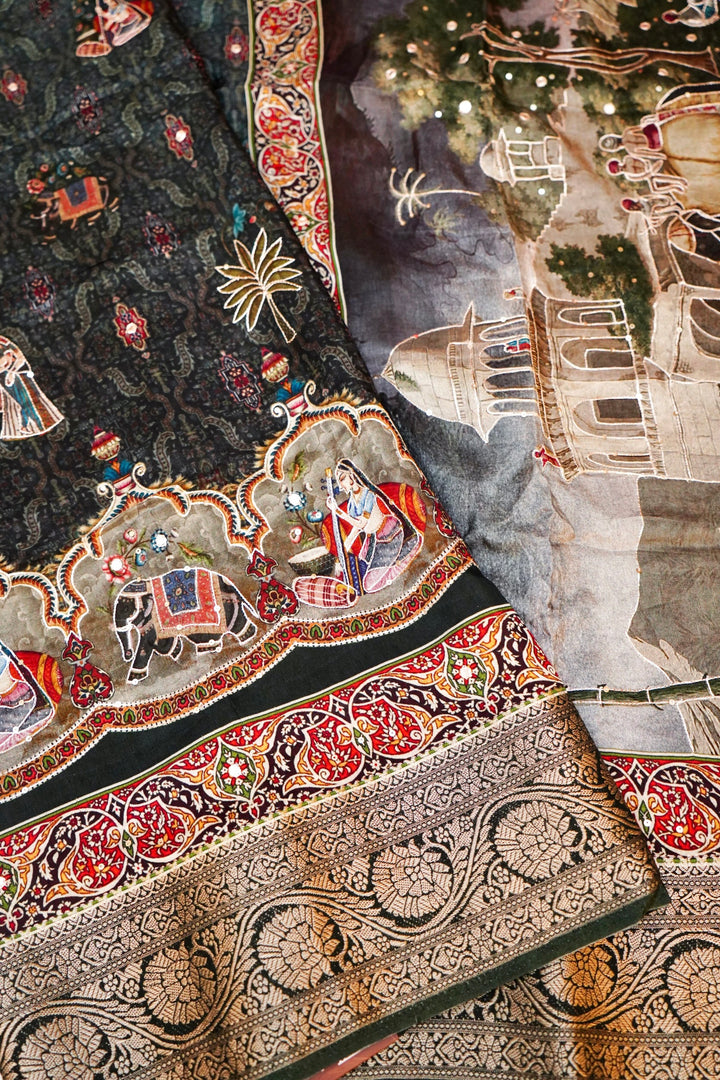 Teal Green Crepe Silk Saree with Statement Figure Motifs