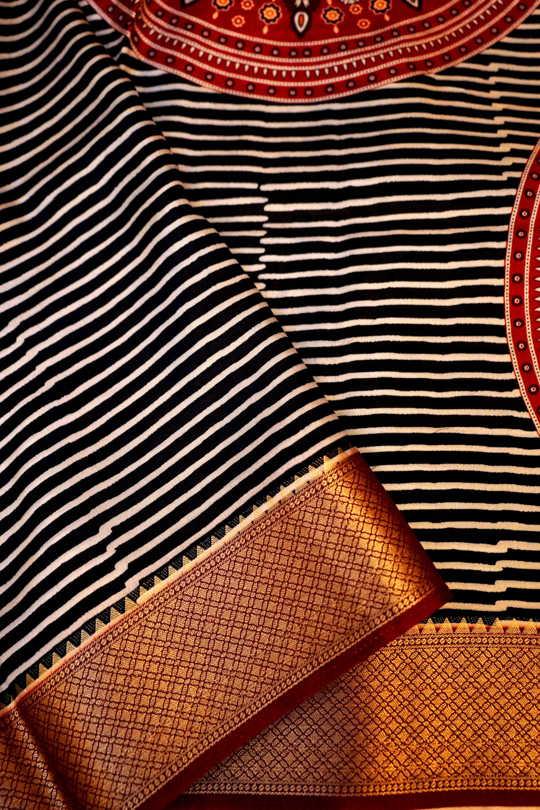 Noir Aura Black Banarasi Crepe Silk Ajrak Print Saree