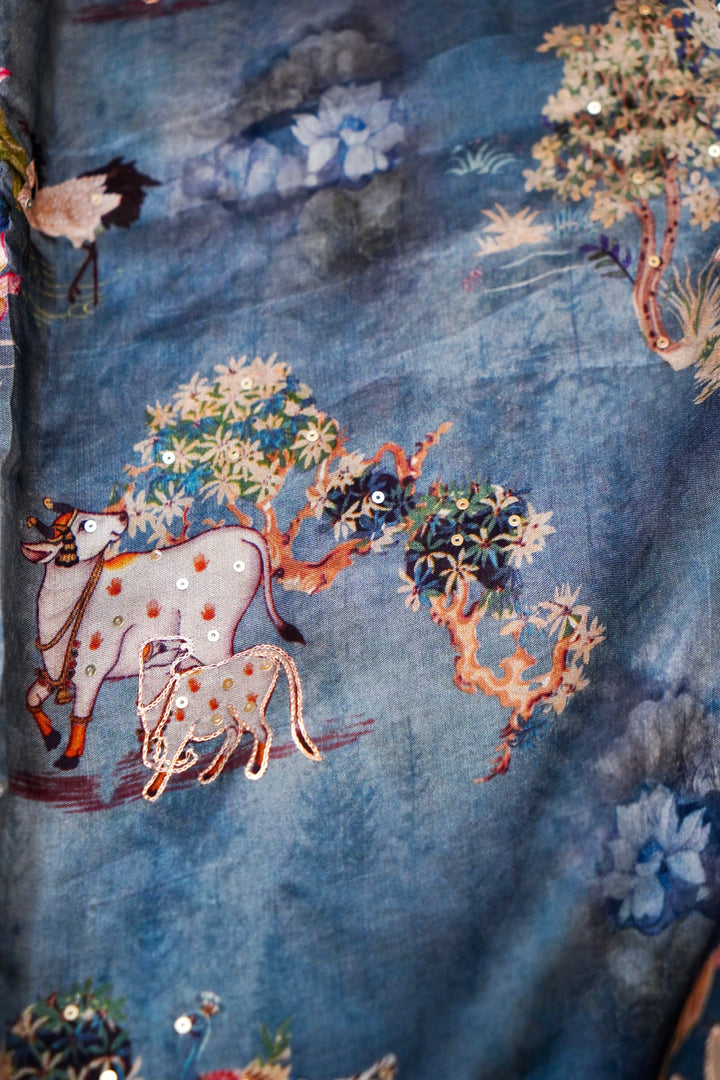 Soft Sky Blue Printed Crepe Silk Saree Featuring Artistic Figure Designs