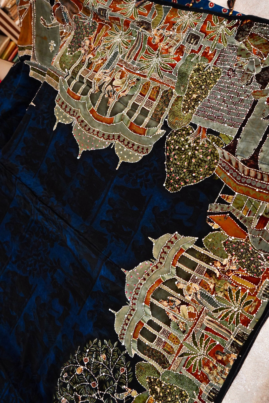 Art-Inspired Teal Blue Crepe Silk Saree – Soft Drape with Unique Figure Prints