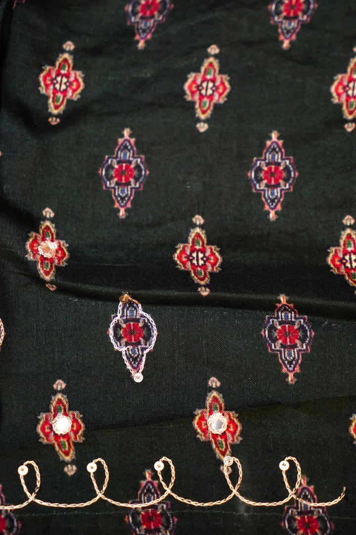 Teal Green Crepe Silk Saree with Statement Figure Motifs