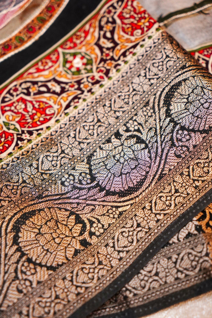 Striking Black Crepe Silk Saree with Handcrafted Style Figure Motifs