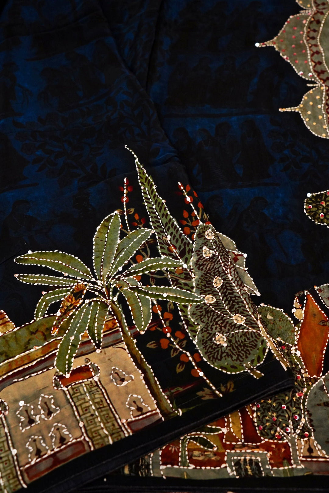 Art-Inspired Teal Blue Crepe Silk Saree – Soft Drape with Unique Figure Prints