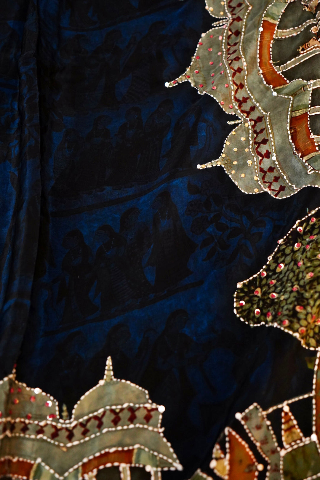 Art-Inspired Teal Blue Crepe Silk Saree – Soft Drape with Unique Figure Prints