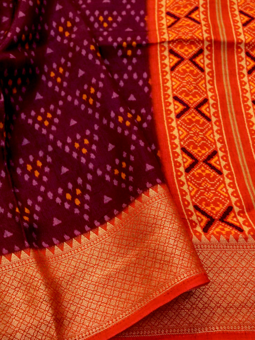 Wine Elegance Crepe Silk Saree with Geometric Prints and Zari Weave Accents