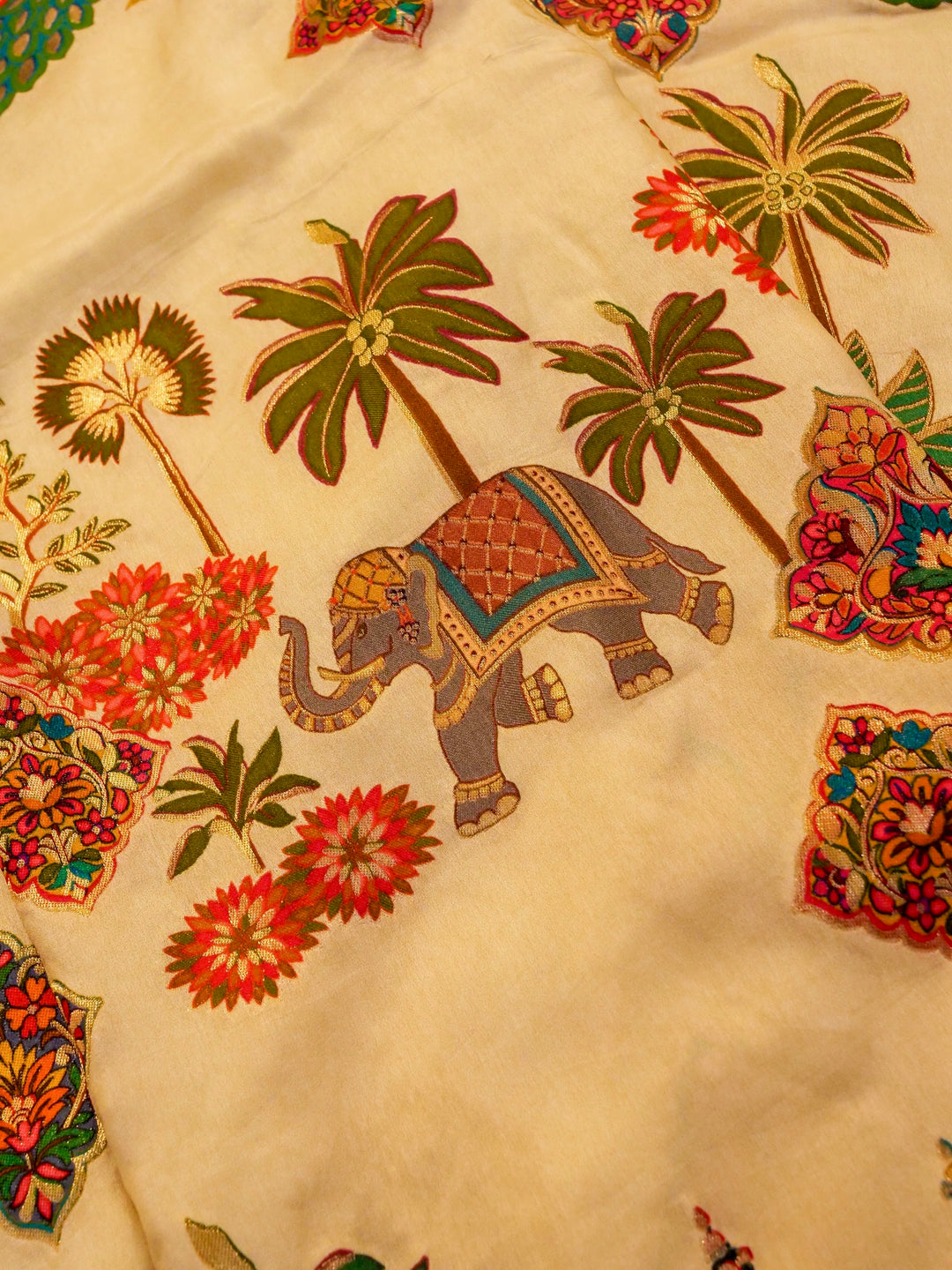 Whispers of Nature Beige Crepe Silk Saree with Bird and Figure Motifs