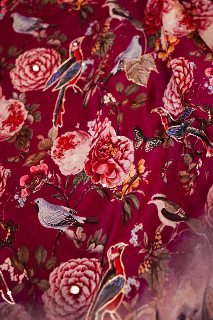 Vibrant Red Printed Crepe Silk Saree Featuring Abstract Figure Design