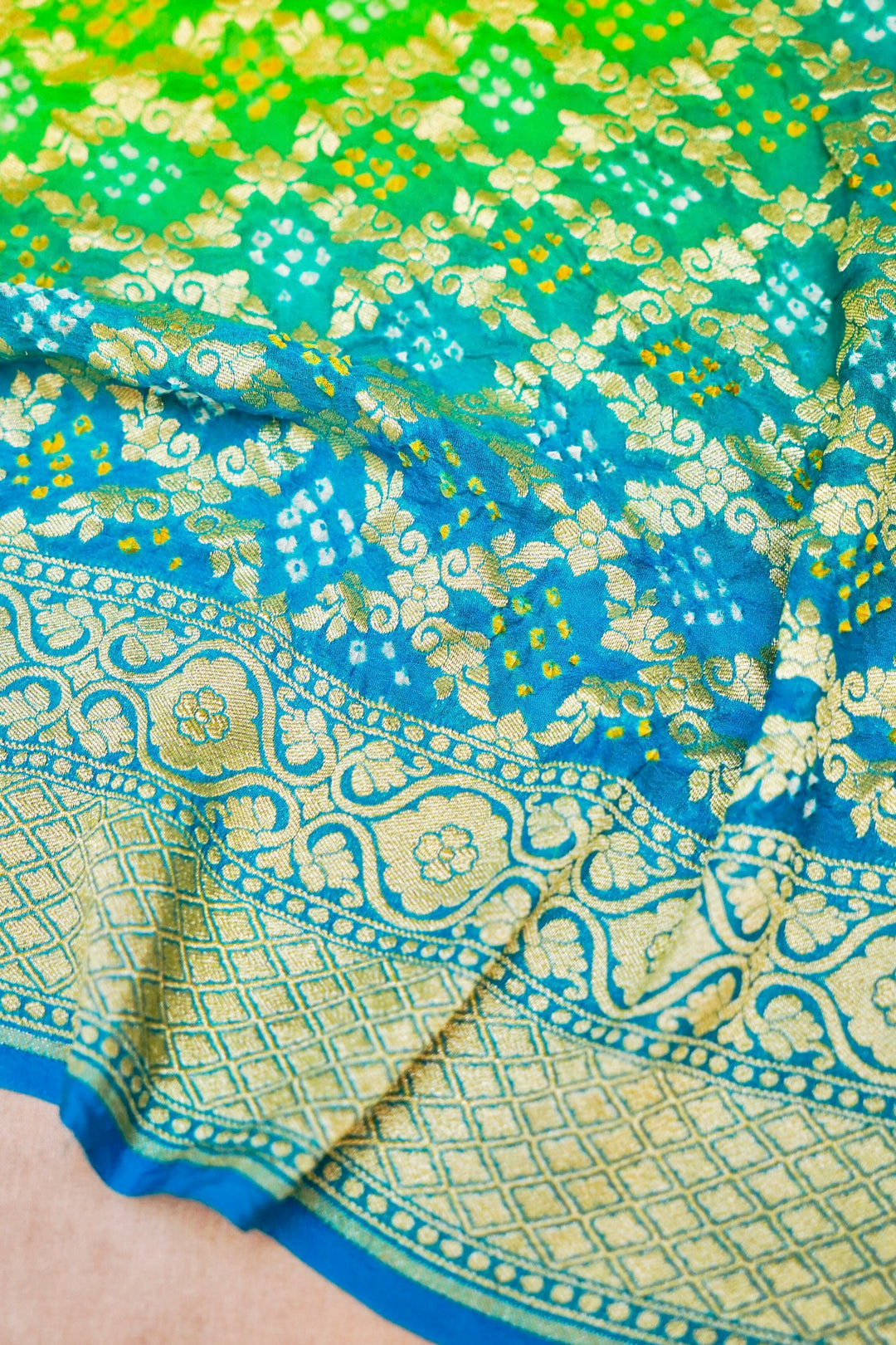 Fresh Elegance Light Green Khaddi Georgette Bandhej Saree with Sky Blue Border