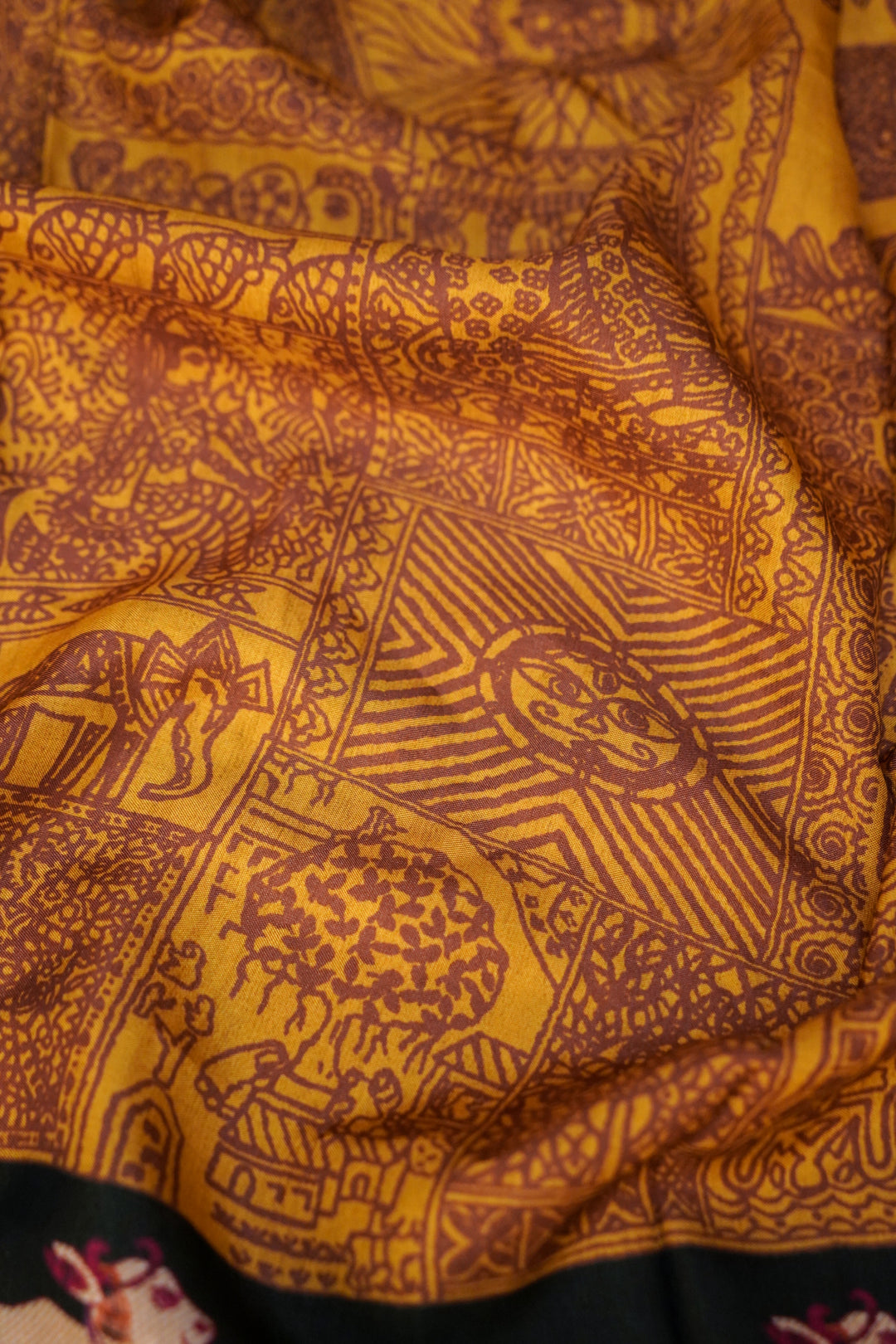 Mustard Crepe Silk Saree with Green Contrast Nandi Motif Pallu &amp; Border