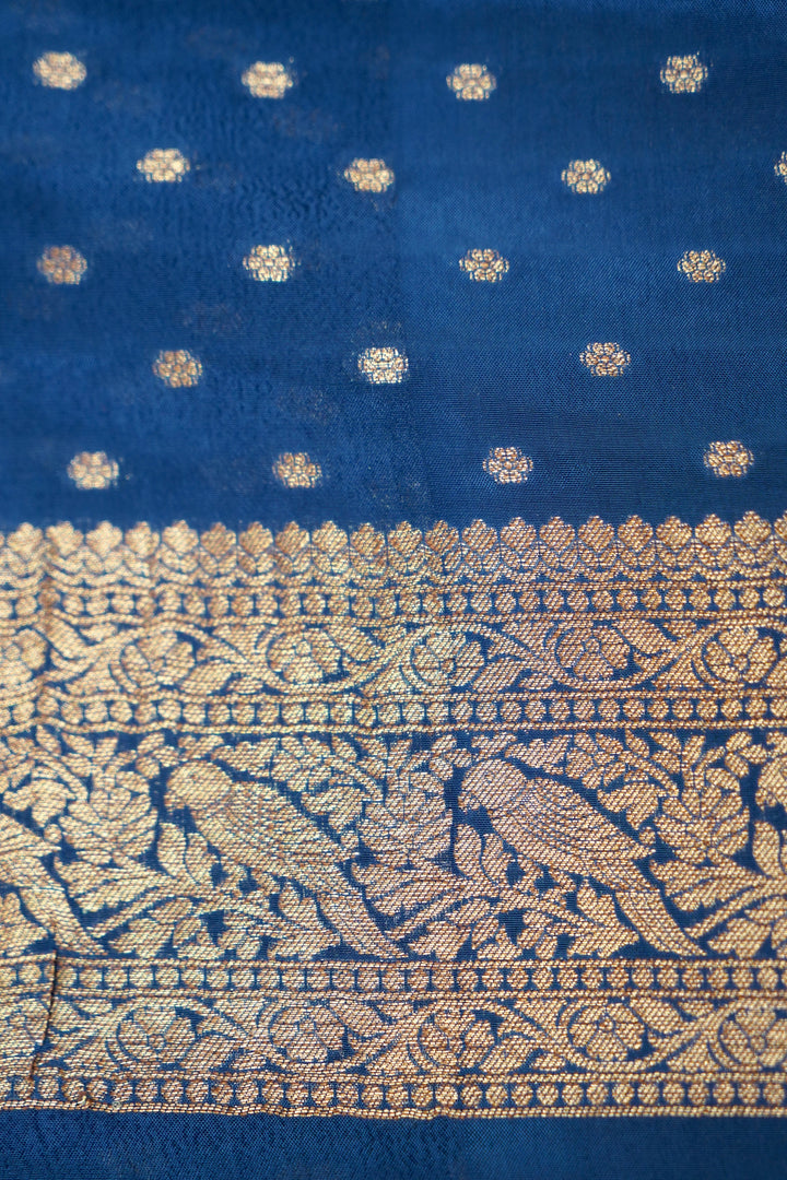 Elegant Teal Blue Banarasi Chinon Georgette Saree with Antique Zari Figure Motifs
