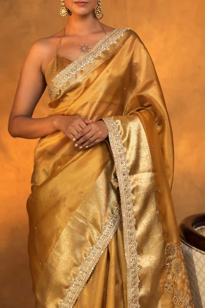golden pure tissue silk gayatri mantra written with baarat inspired pallu scallop lace border closeup view 2