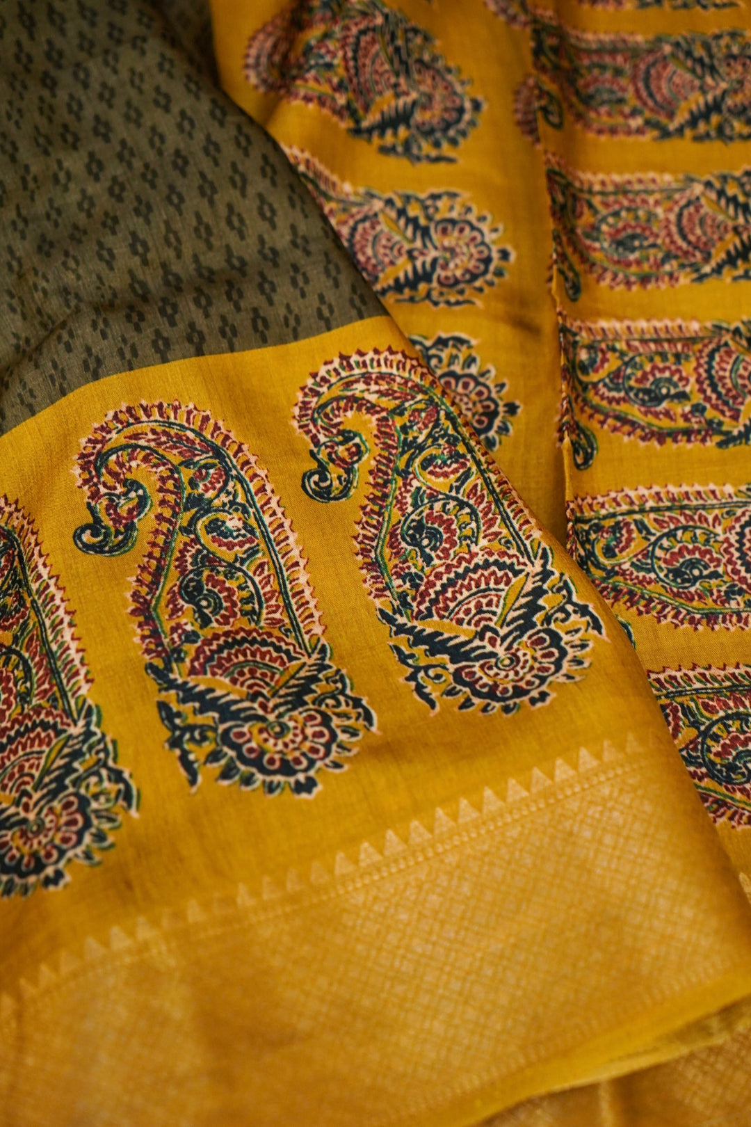 Green Crepe Silk Saree with Meenakari Carry Motif &amp; Yellow Contrast Border