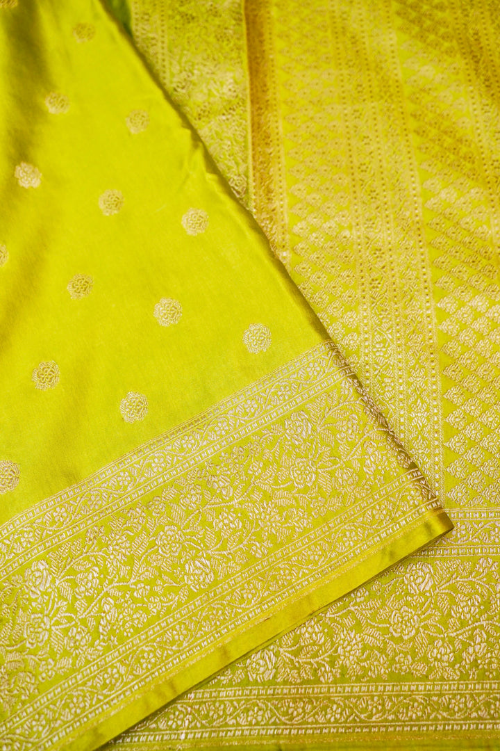 Vibrant Grace in Neon Green Mashru Silk Saree with All-Over Silver Zari Weave
