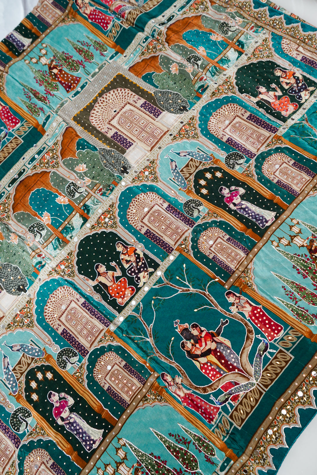 Teal Green Crepe Silk Saree with Katha Embroidery & Printed Figure Motifs