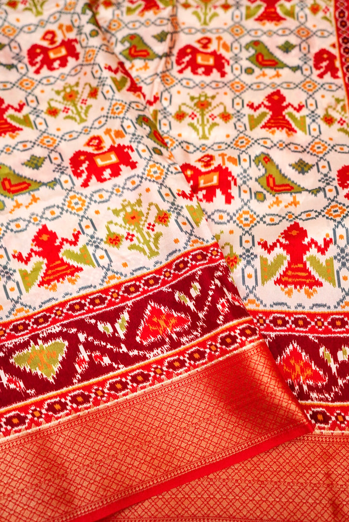 White Patola Silk Saree with Zari Weave Contrast Border