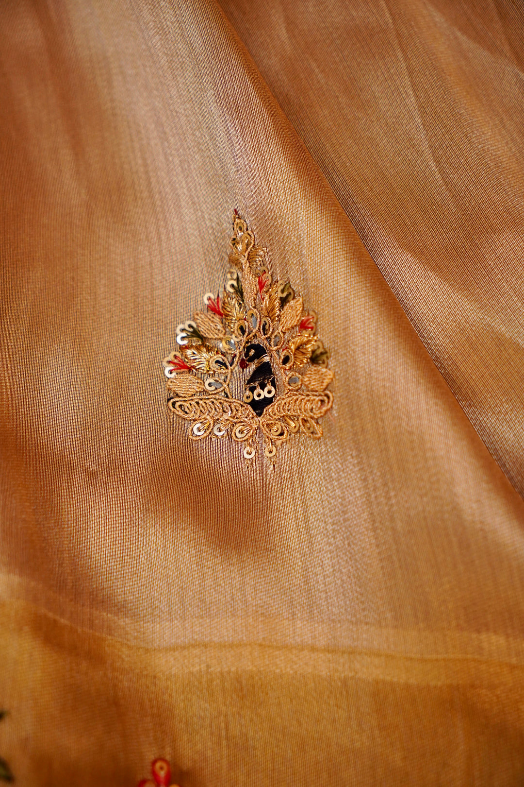 Tanmaya – Designer Copper Gold Tissue Silk Saree