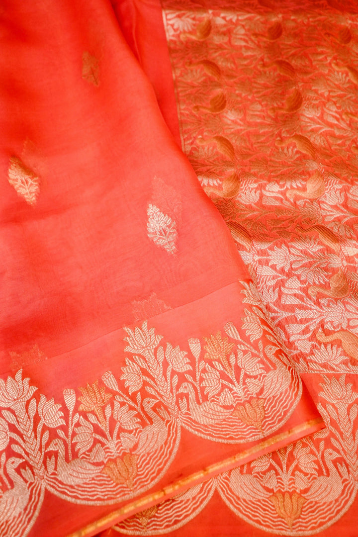 Elegant Peach Sonaroopa Muslin Organza Birds Motif Saree