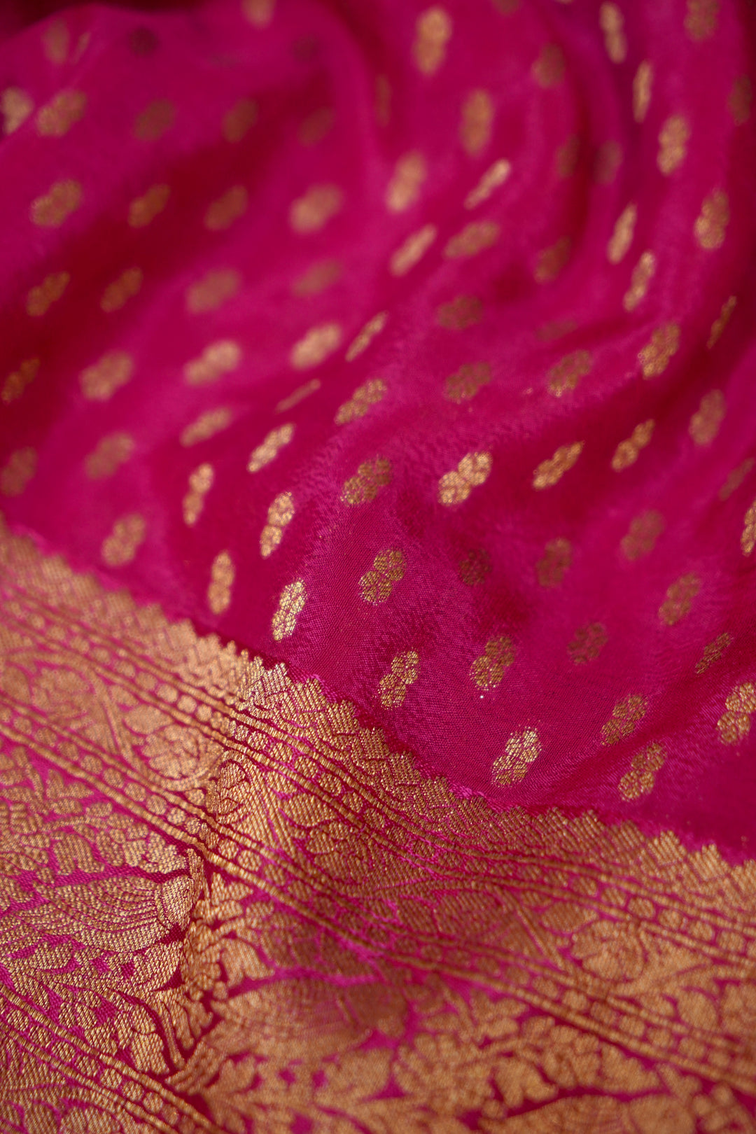 Vibrant Rani Pink Banarasi Chinon Georgette Saree with Antique Zari Figure Motifs
