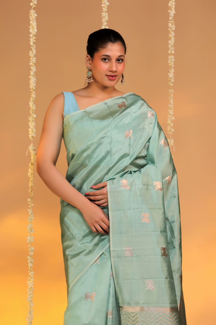 banarasi handloom pastel green pure mashru silk lion motif saree closup view 1