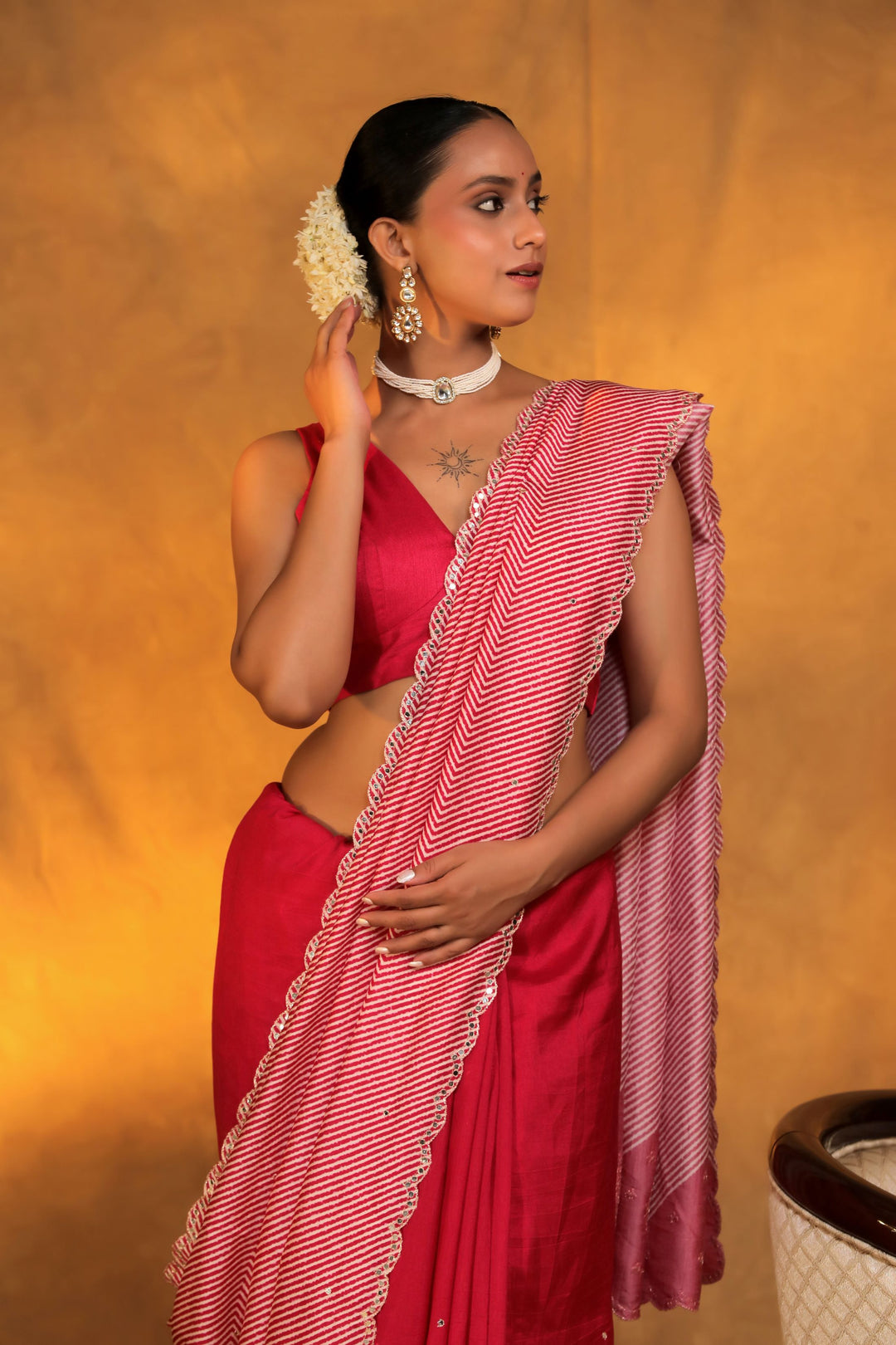 pink crepe silk geometric strip mirror work saree closeup view