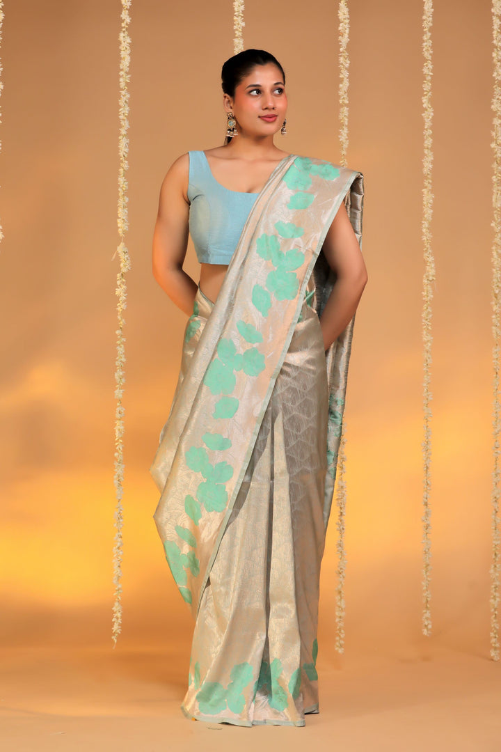banarasi handloom pastel green pure katan silk structured floral grid motif saree front view 2