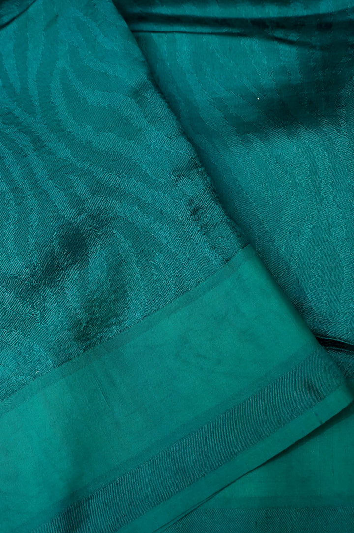 Enchanted Teal Elegance – Pure Handloom Silk Saree with Animal Weaving