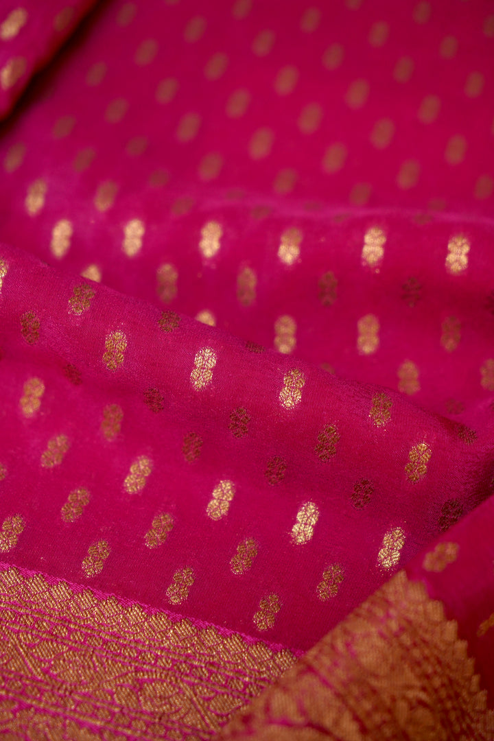 Vibrant Rani Pink Banarasi Chinon Georgette Saree with Antique Zari Figure Motifs