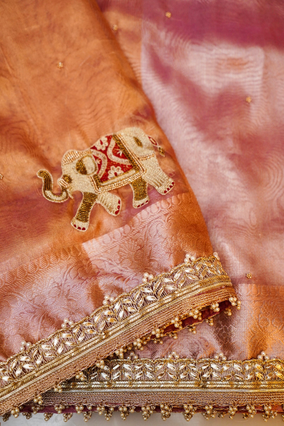Golden Tissue Silk Saree with Pitta Zari Elephant Motifs & Scallop Border