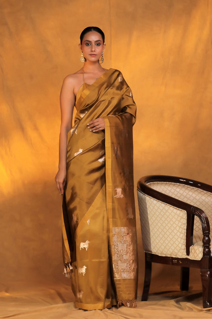 handwoven mustard banarasi pure mashru silk pichwai motif saree close view 2