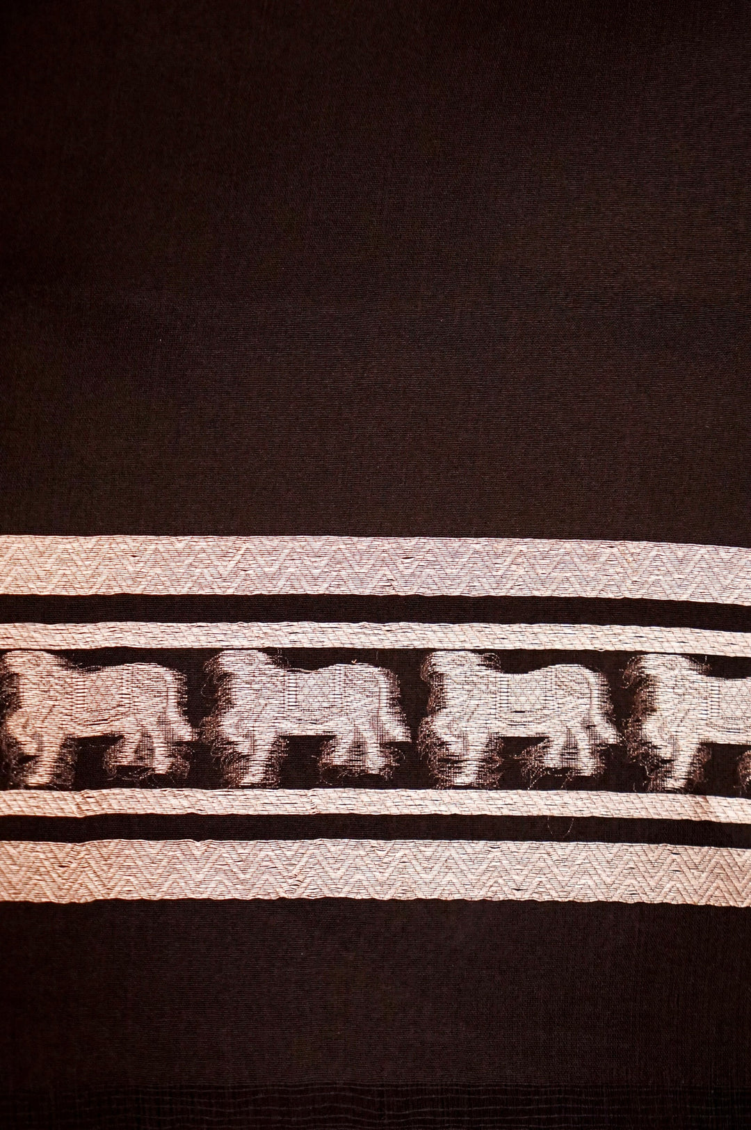 Majestic Earth – Brown Pure Handloom Organza Silk Saree with Elephant Motif Border