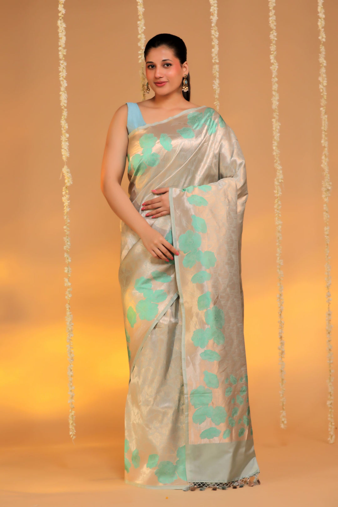 banarasi handloom pastel green pure katan silk structured floral grid motif saree front view 1
