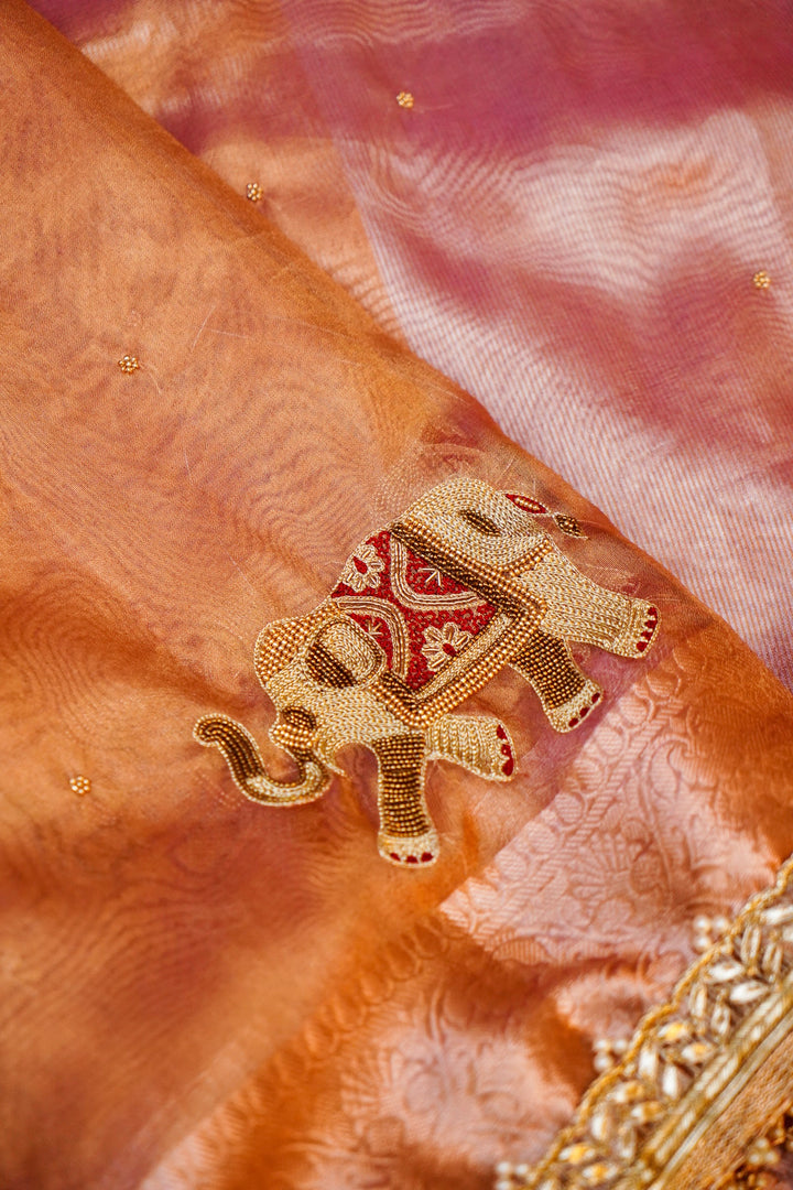 Golden Tissue Silk Saree with Pitta Zari Elephant Motifs & Scallop Border