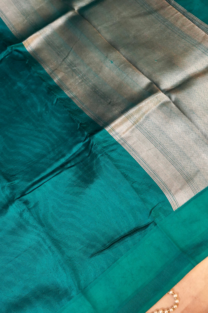 Enchanted Teal Elegance – Pure Handloom Silk Saree with Animal Weaving