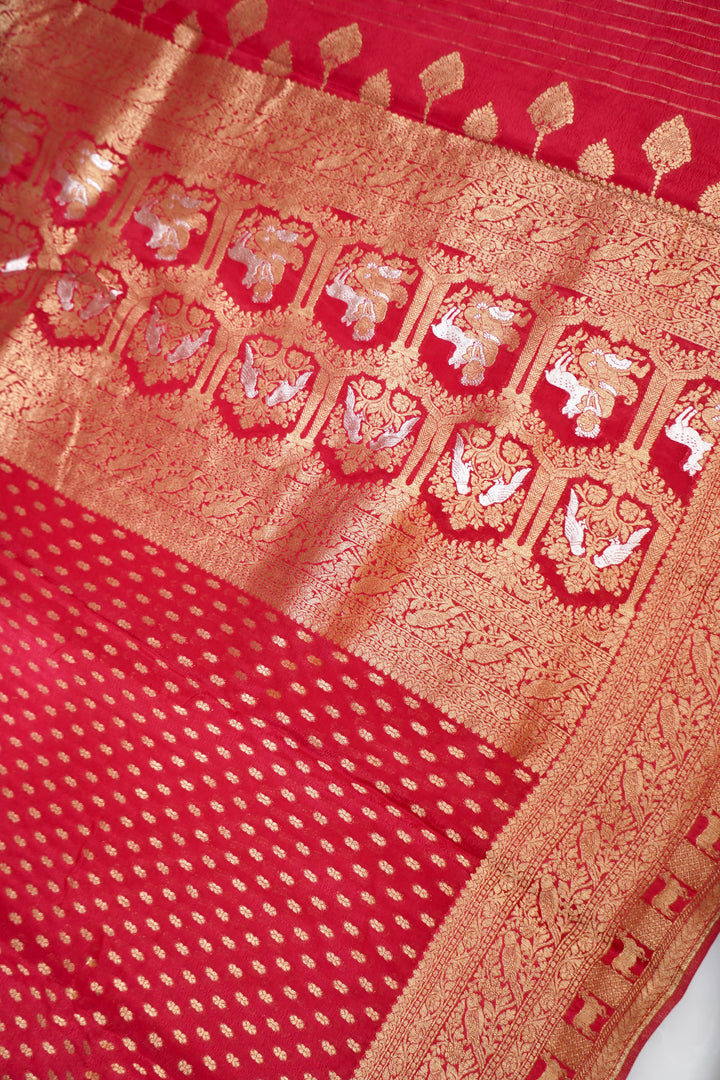 Striking Cherry Red Banarasi Chinon Georgette Saree with Antique Zari Figure Motifs
