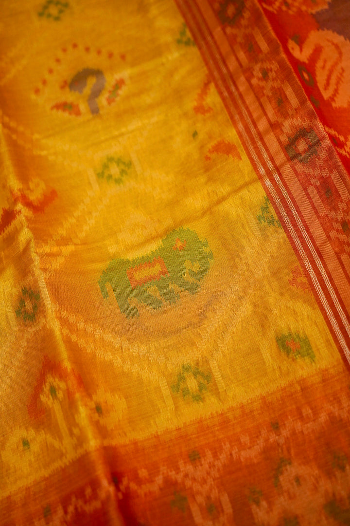 Golden Banarasi Silk Tissue Saree with Ikkat-Patola Inspired Weave
