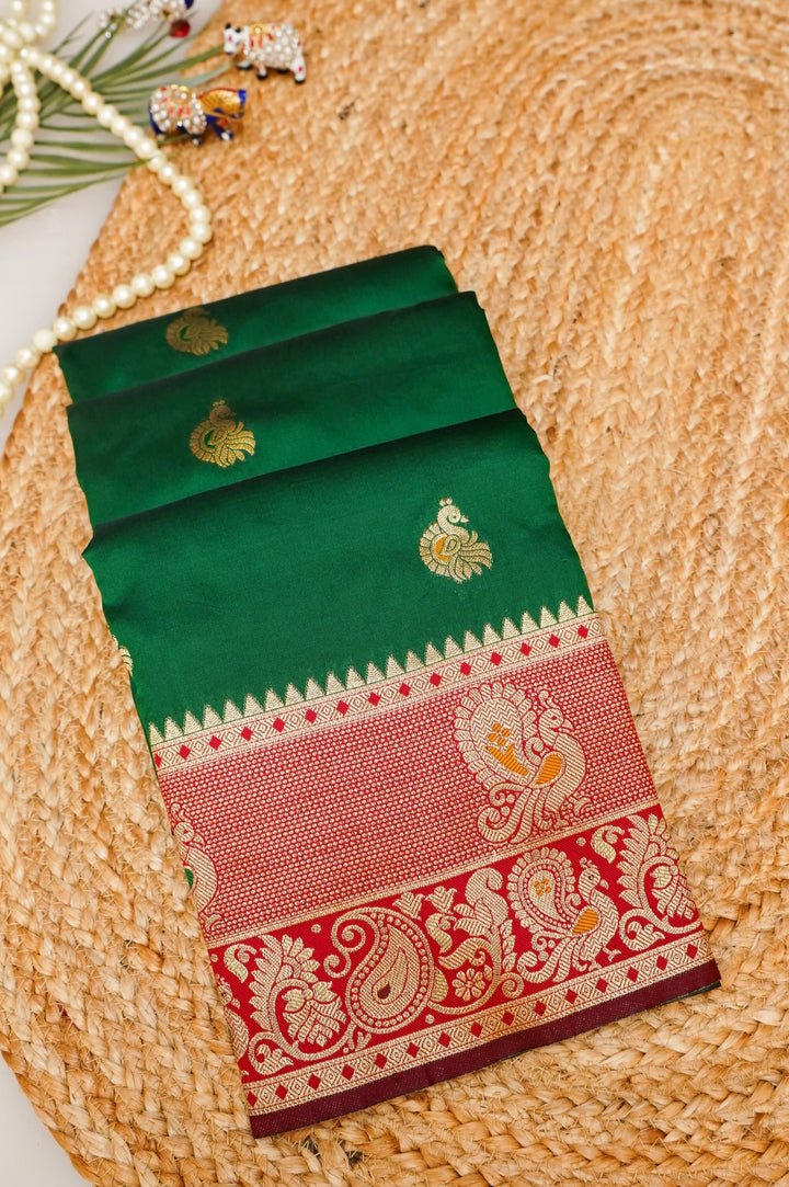 Bottle Green Soft Silk Kanjivaram Inspired Bird Motifs Saree with Red Contrast Border Pallu