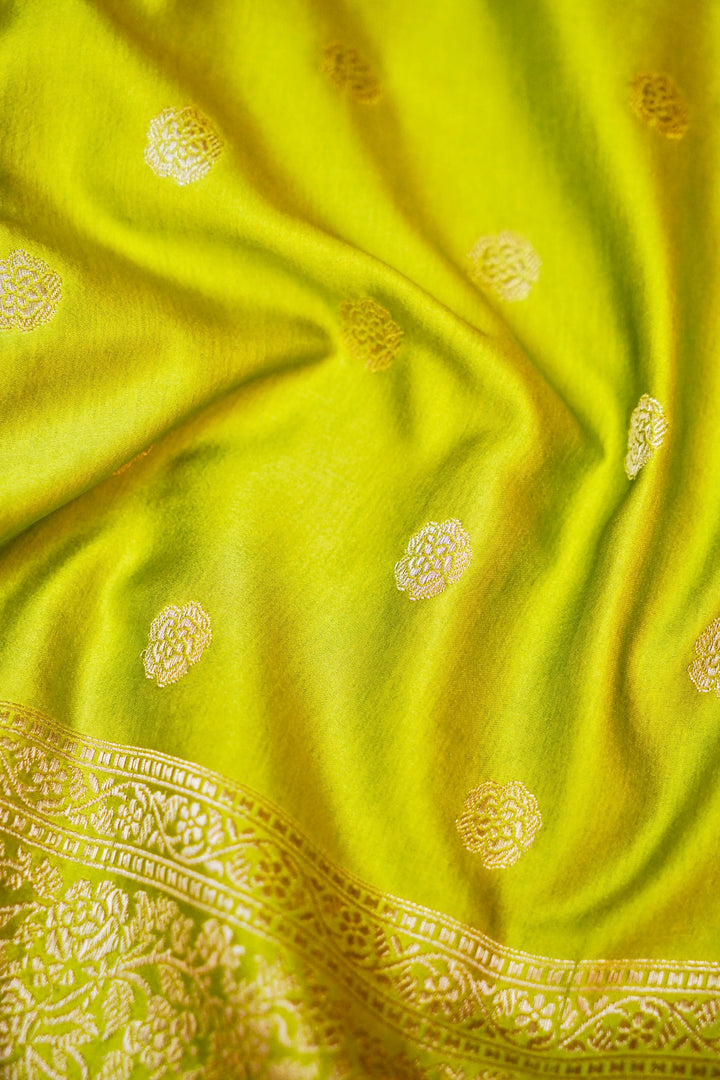 Vibrant Grace in Neon Green Mashru Silk Saree with All-Over Silver Zari Weave