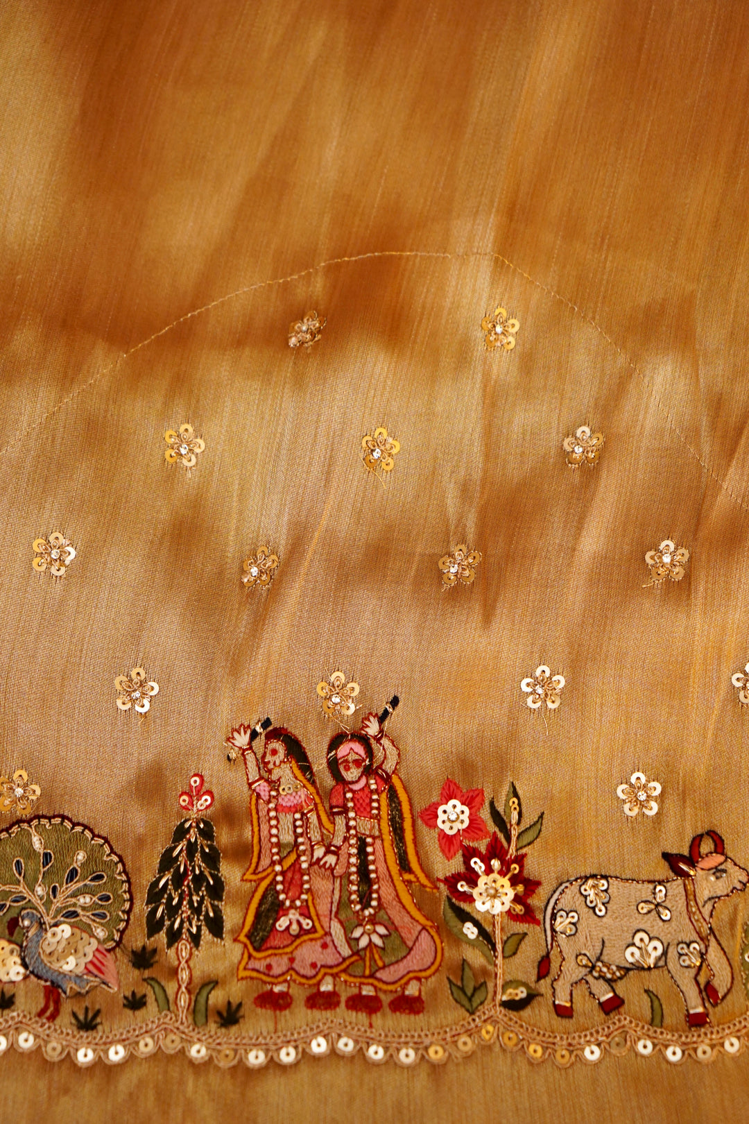 Tanmaya – Designer Copper Gold Tissue Silk Saree