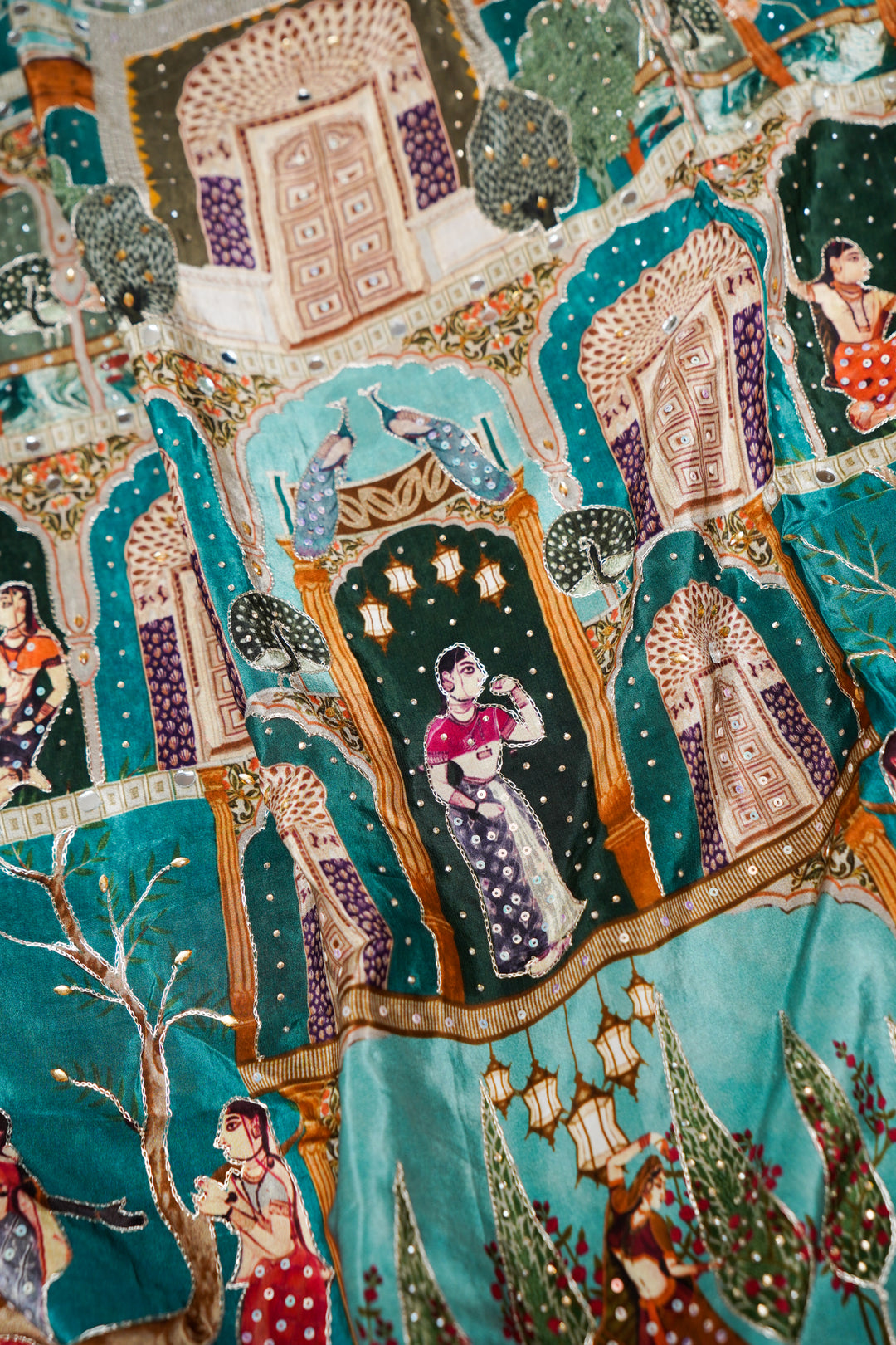 Teal Green Crepe Silk Saree with Katha Embroidery & Printed Figure Motifs